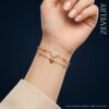 Gold Stainless Steel Bracelet – Élan Amour Heart Bracelet ZEVELRY Model wearing Gold Stainless Steel Bracelet – Élan Amour Heart Bracelet ZEVELRY