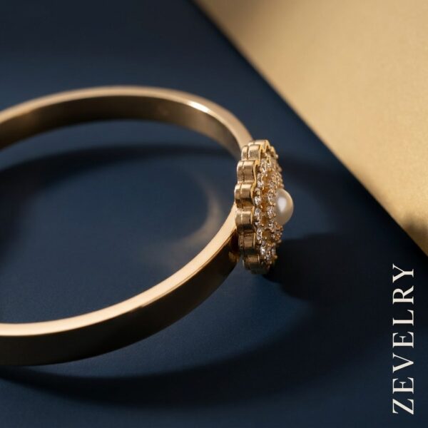 Gold Stainless Steel Pearl Bangle Aurelia Pearl Halo Bangle ZEVELRY Side Gold Stainless Steel Pearl Bangle Aurelia Pearl Halo Bangle ZEVELRY
